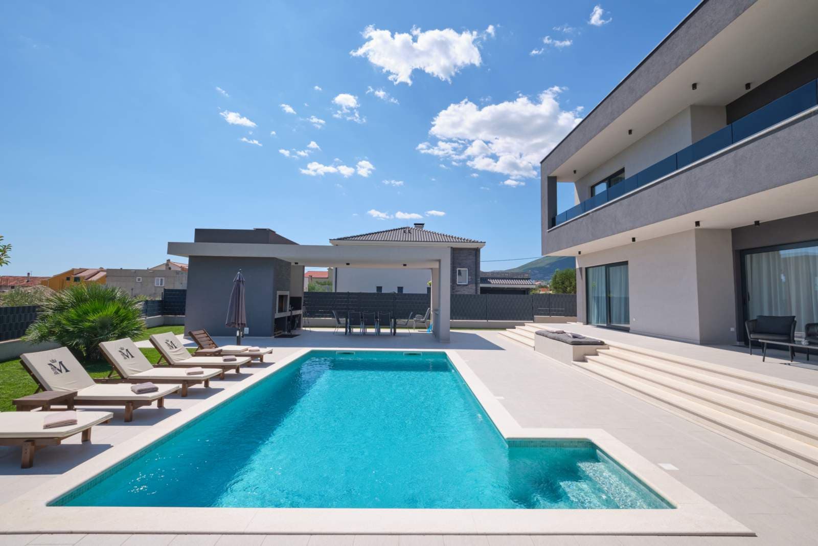 Sun loungers by the pool