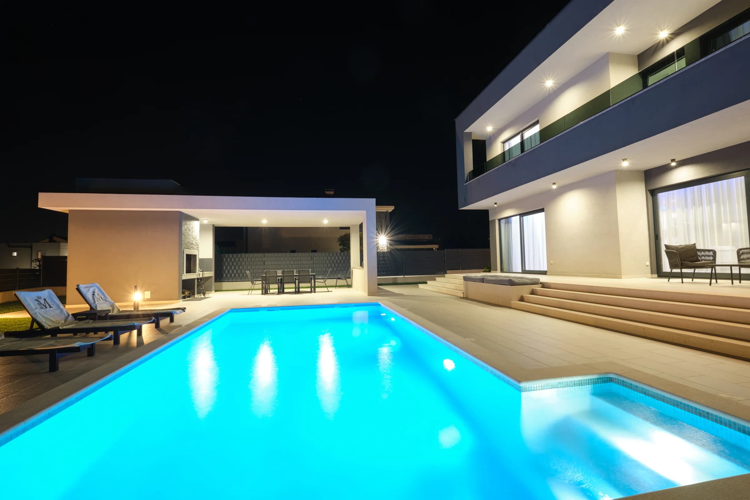 Villa Marina, pool and villa at night